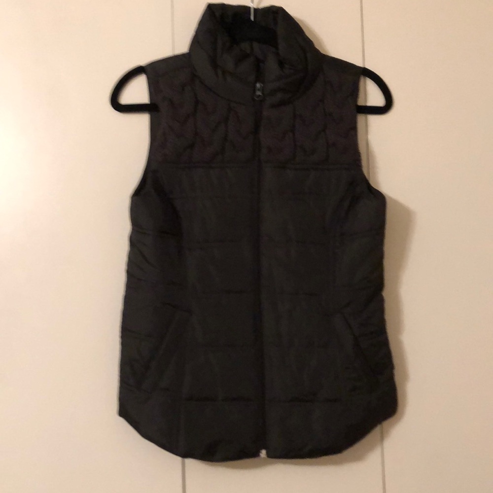 Black puffer vest with knit detailing